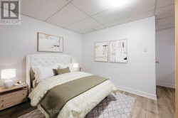 Virtually staged Basement bedroom - 