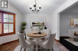 Virtually staged eat in kitchen - 