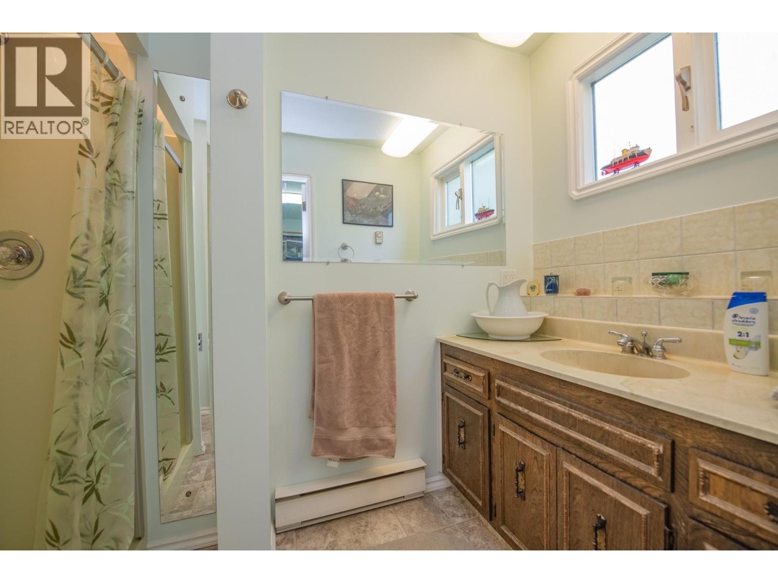 Lower Level Bathroom - 40 Rosoman Road, Enderby, BC