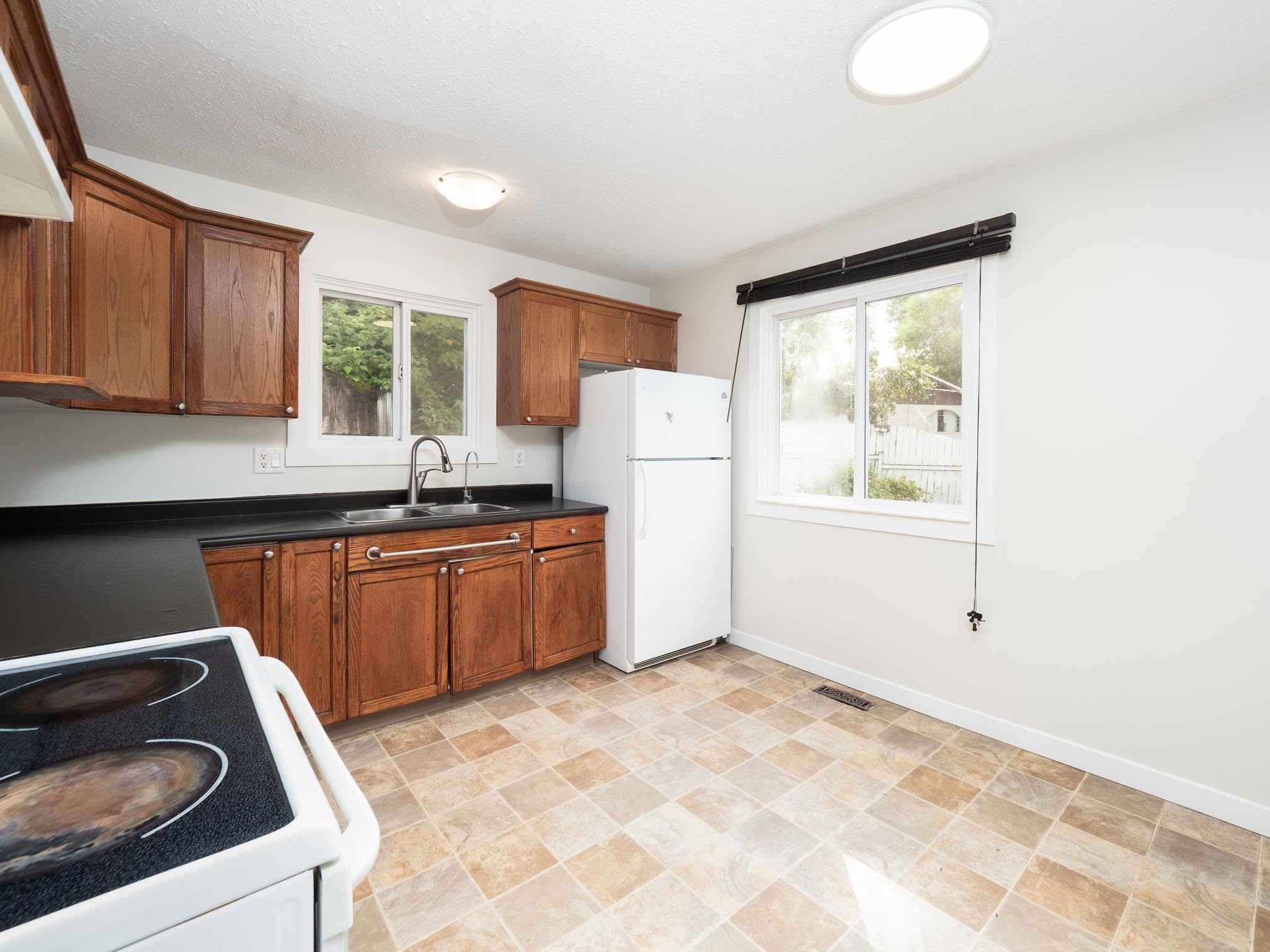 2650 Quince Street, Prince George, BC - Indoor Photo Showing Kitchen With Double Sink