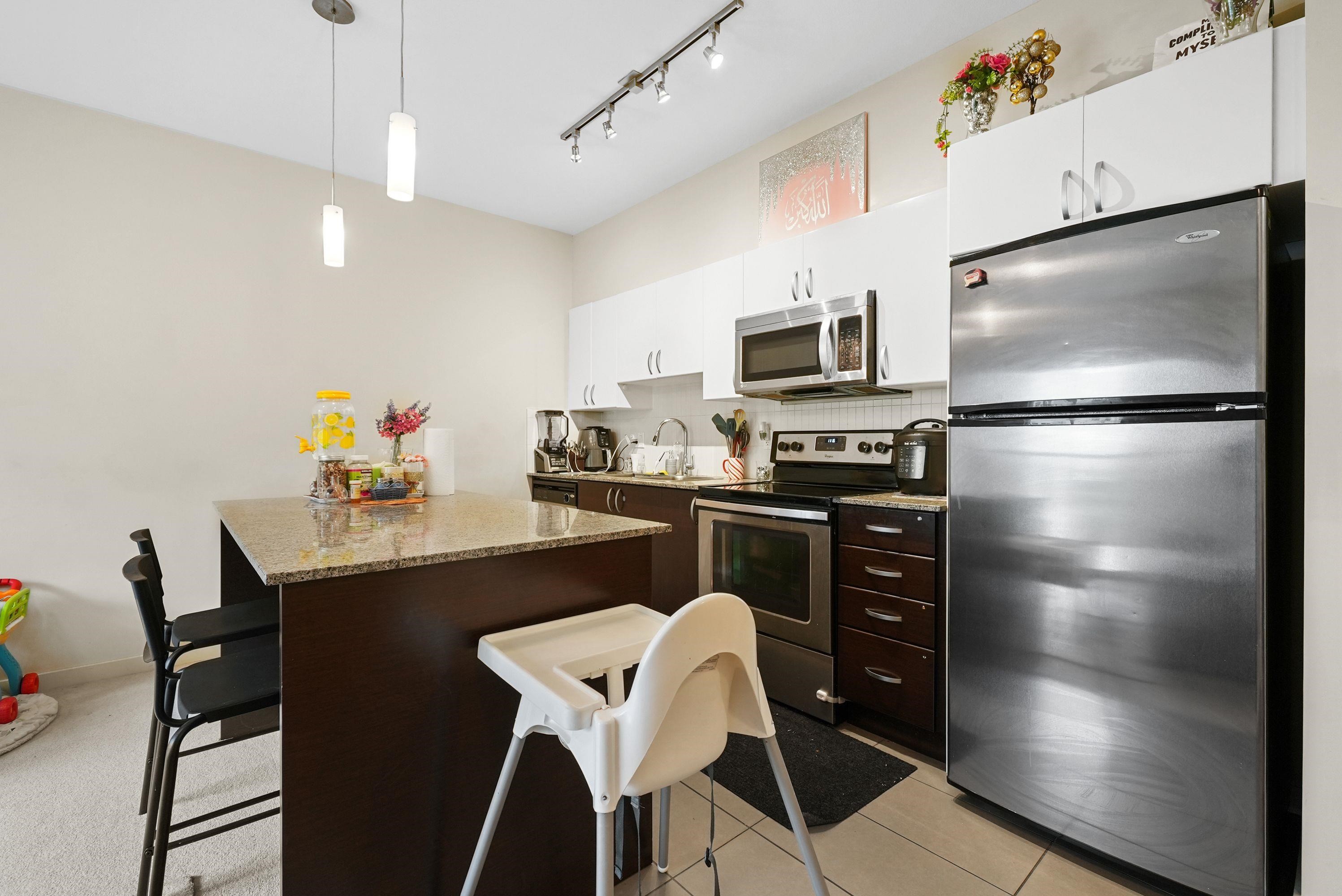 210-13728 108 Avenue, Surrey, BC