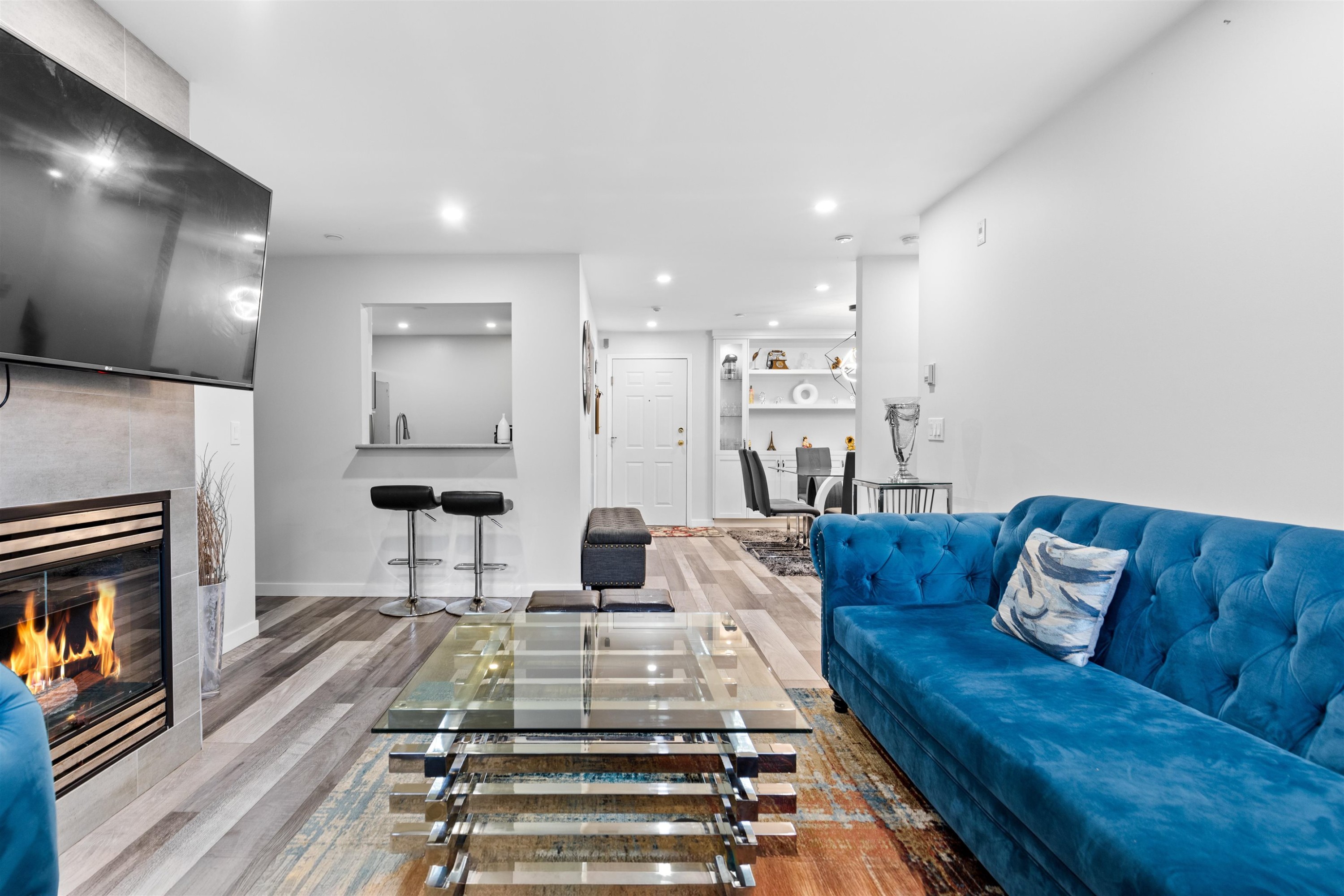 105-12125 75A Avenue, Surrey, BC - Indoor Photo Showing Living Room With Fireplace