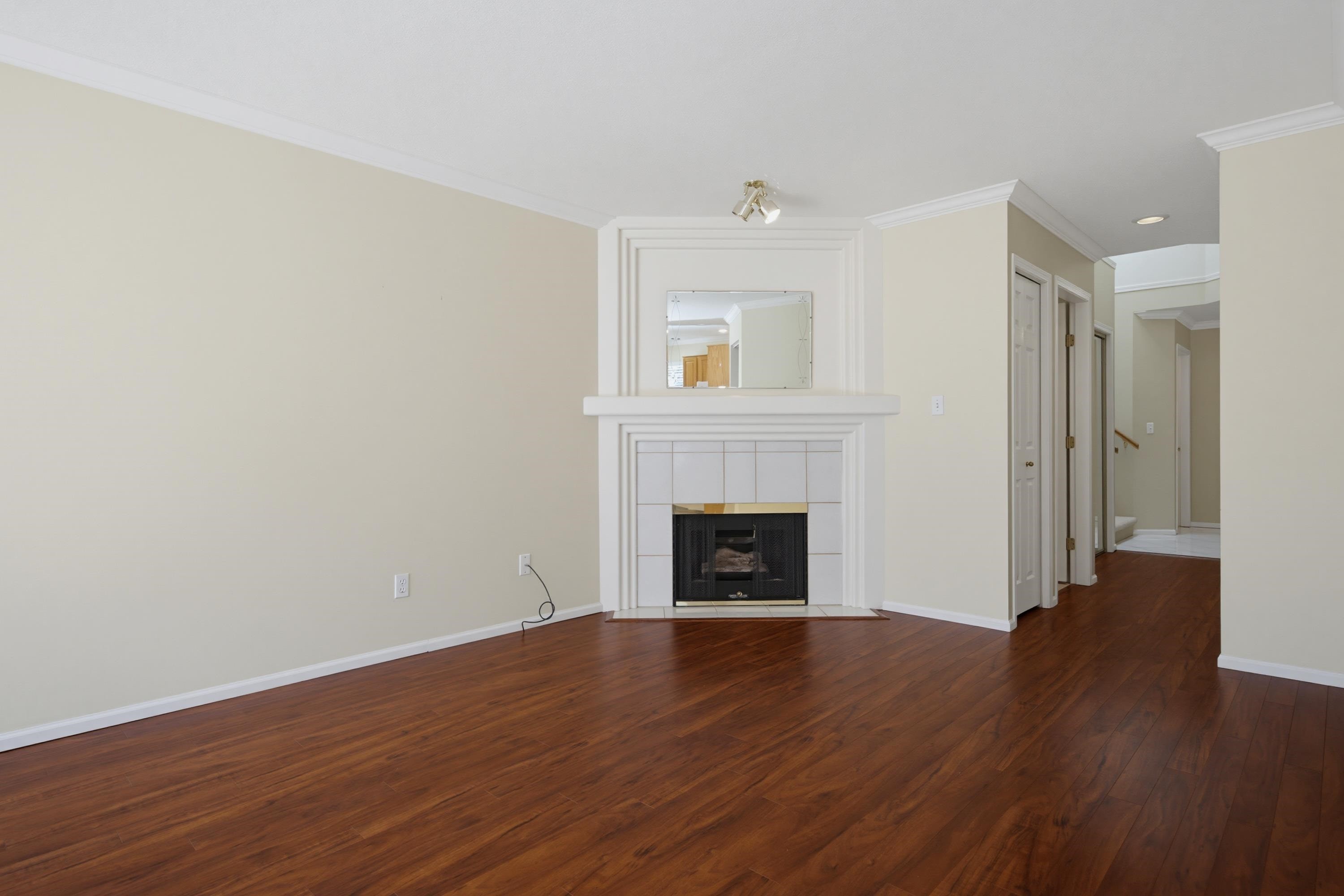 107-15988 83 Avenue, Surrey, BC - Indoor Photo Showing Living Room With Fireplace