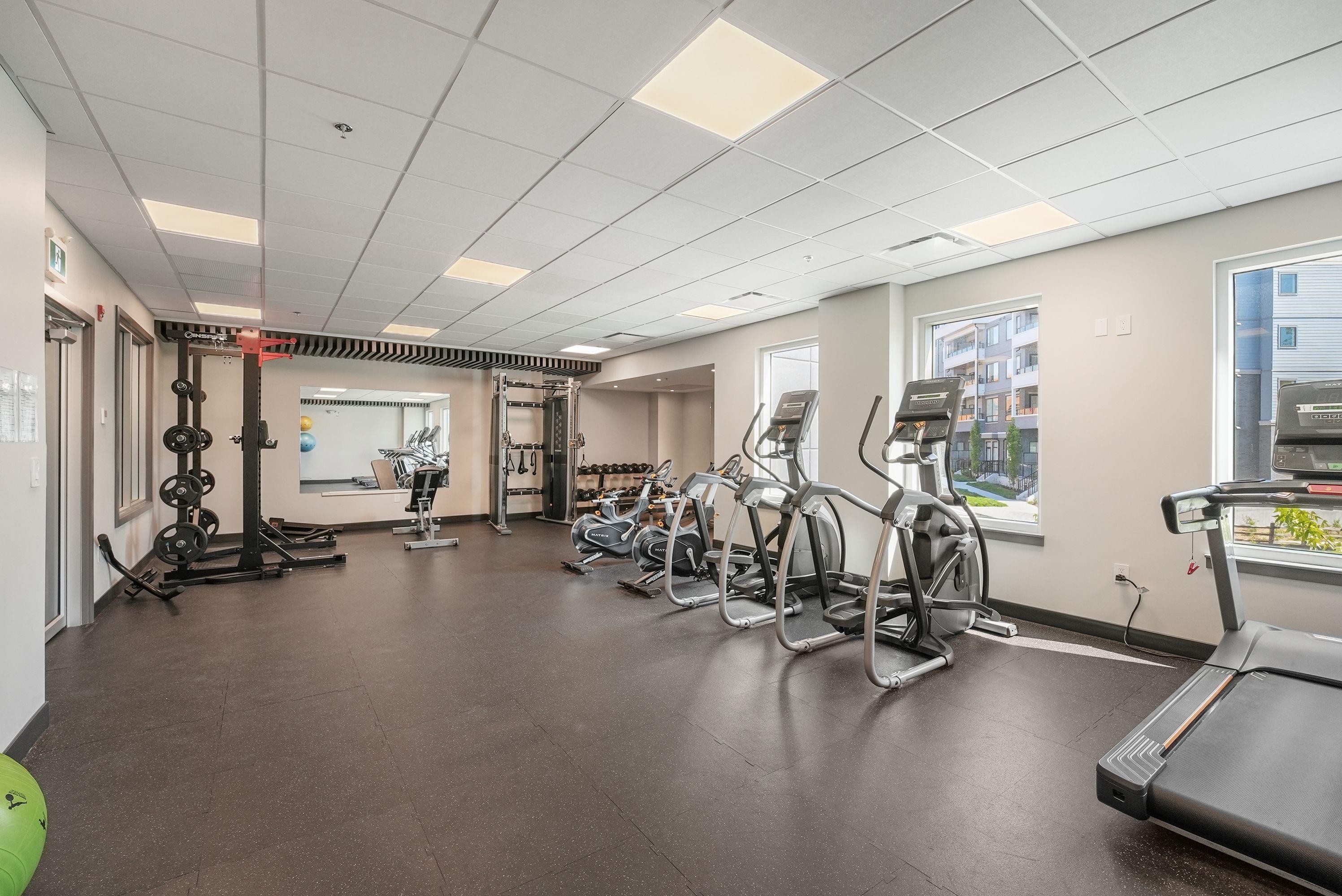 409-6270 Gooseberry Drive, Surrey, BC - Indoor Photo Showing Gym Room