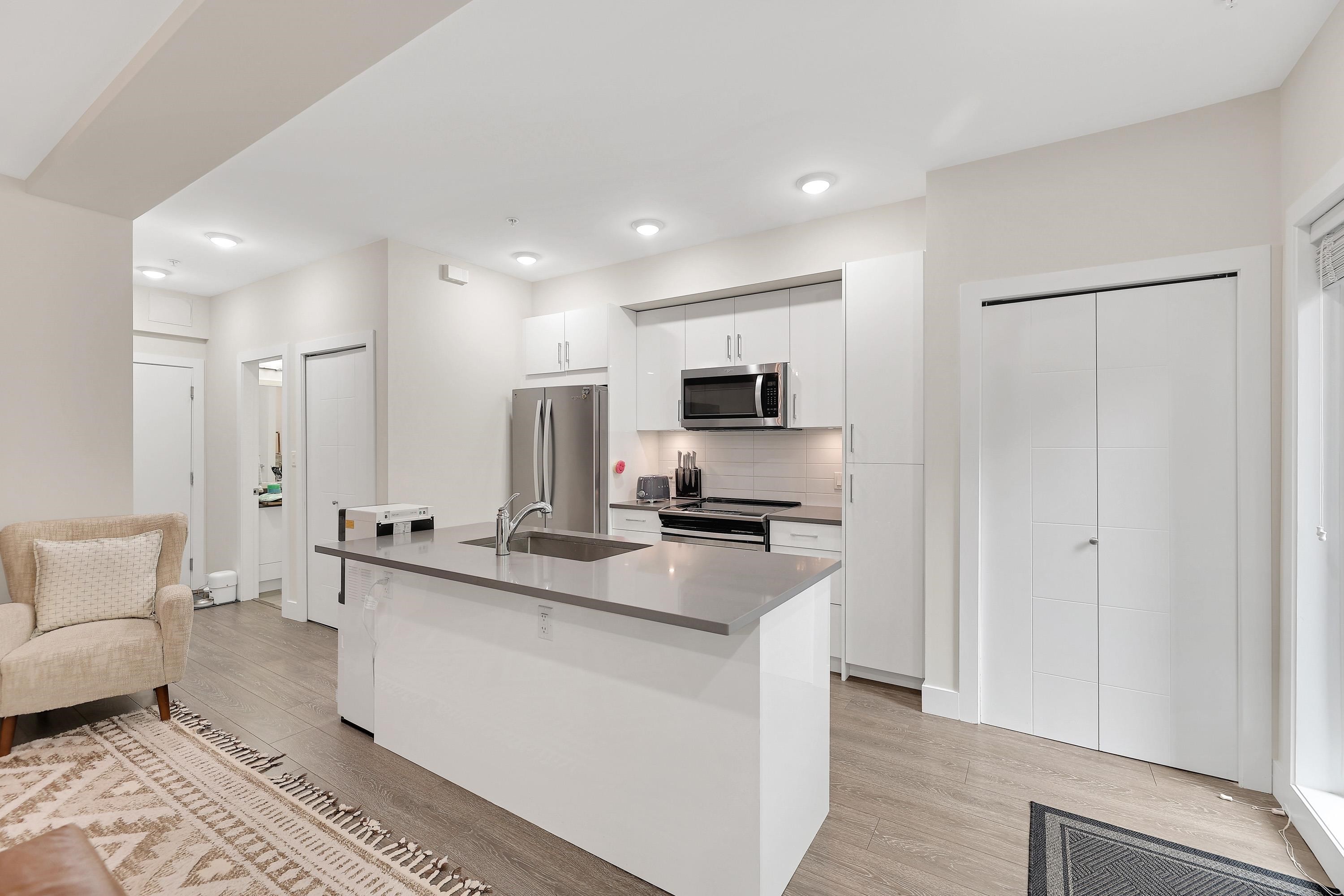 116-15351 101 Avenue, Surrey, BC - Indoor Photo Showing Kitchen With Stainless Steel Kitchen