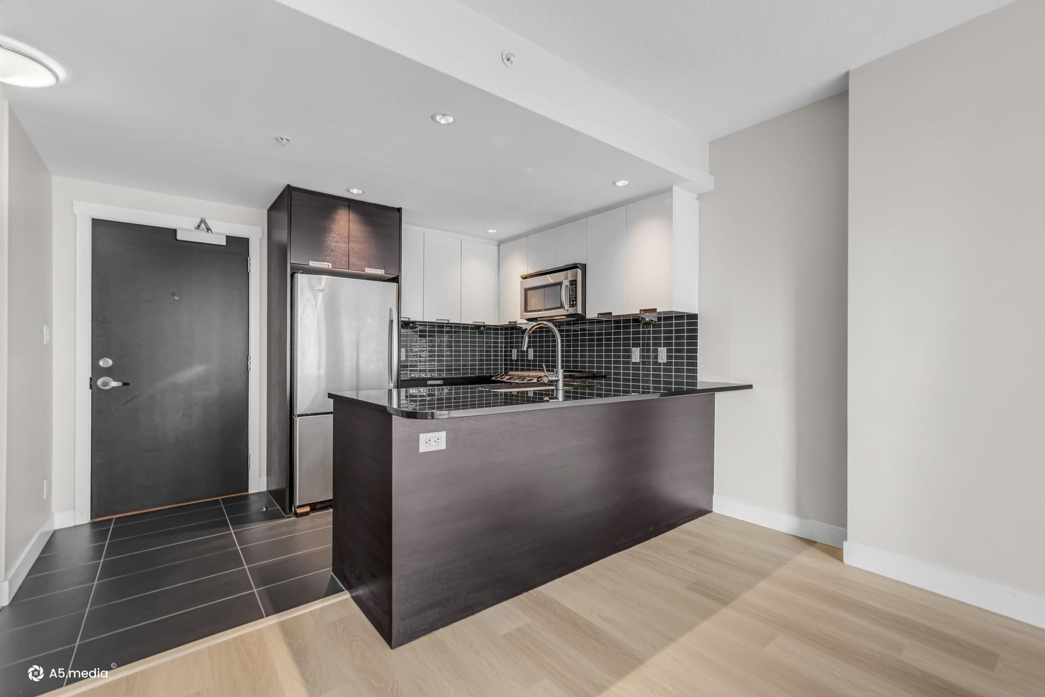 706-2968 Glen Drive, Coquitlam, BC