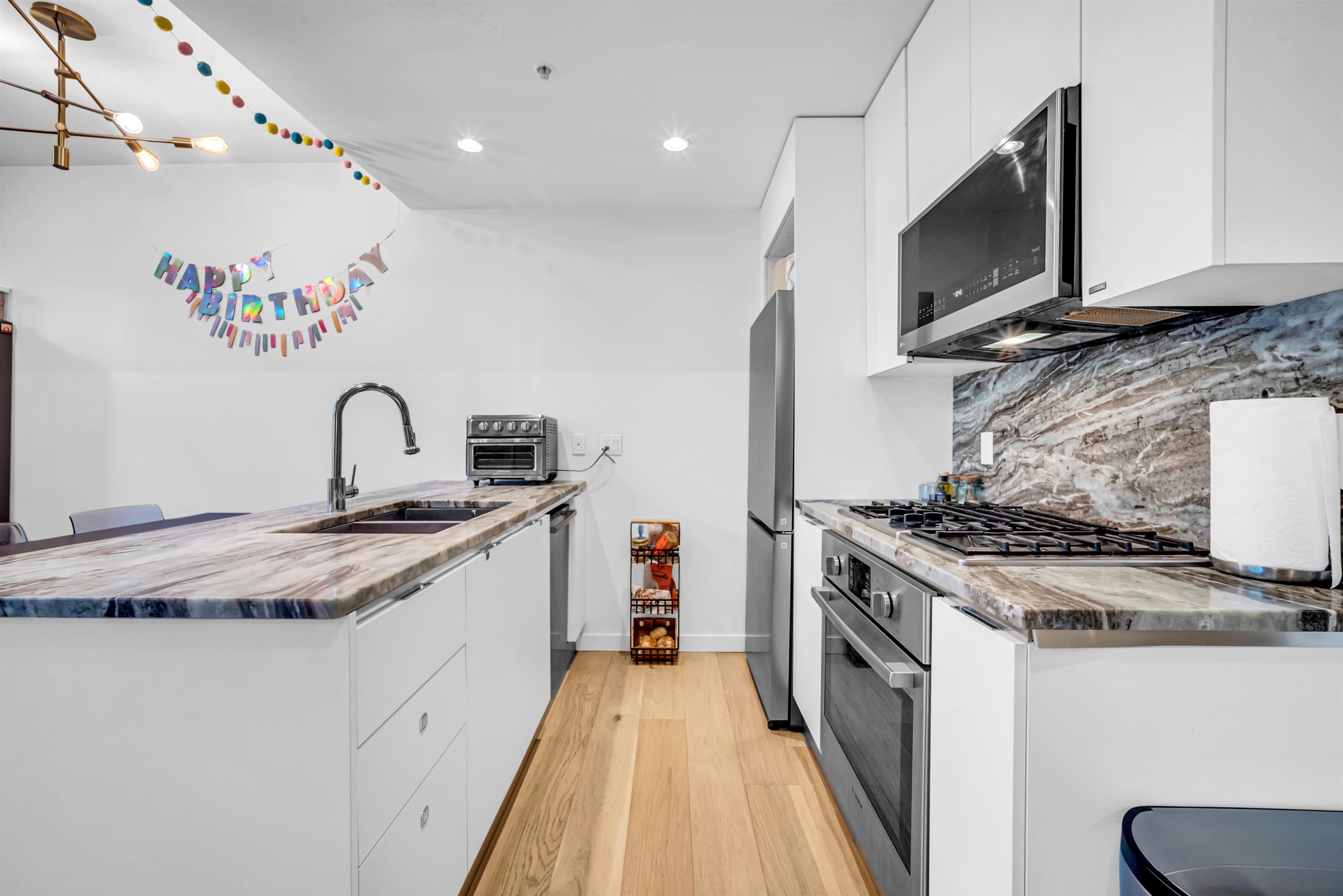 2021 10Th Avenue W, Vancouver, BC - Indoor Photo Showing Kitchen With Double Sink With Upgraded Kitchen