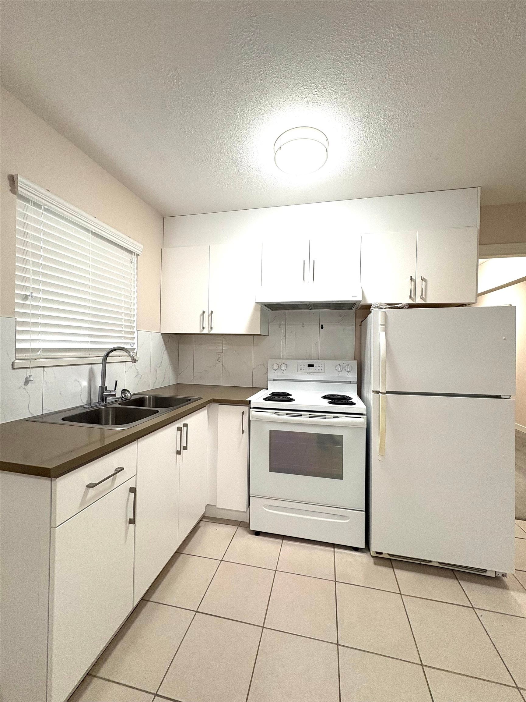4156 Cambridge Street, Burnaby, BC - Indoor Photo Showing Kitchen With Double Sink