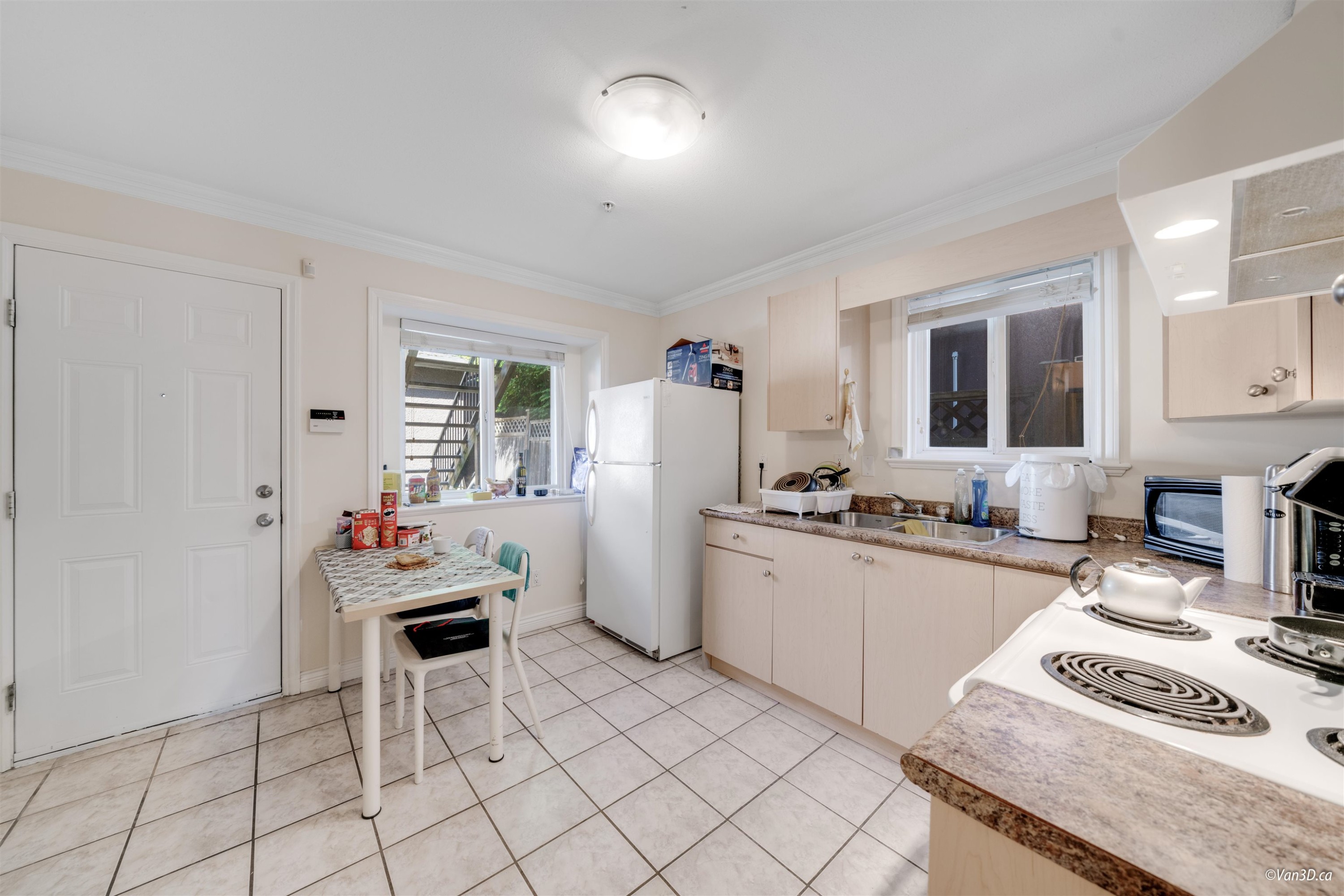 7531 Oak Street, Vancouver, BC - Indoor Photo Showing Kitchen With Double Sink