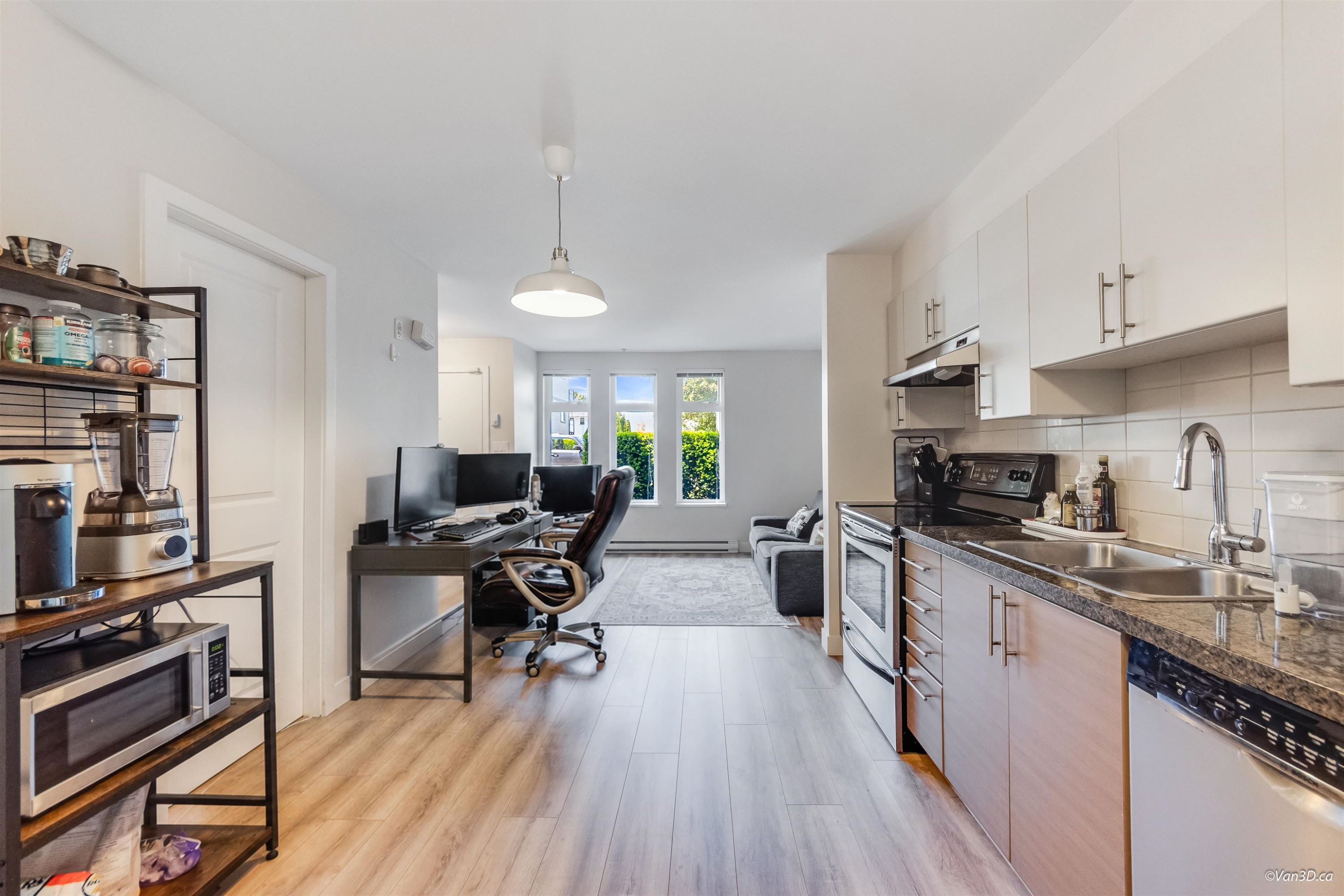 101-5568 Kings Road, Vancouver, BC - Indoor Photo Showing Kitchen With Double Sink