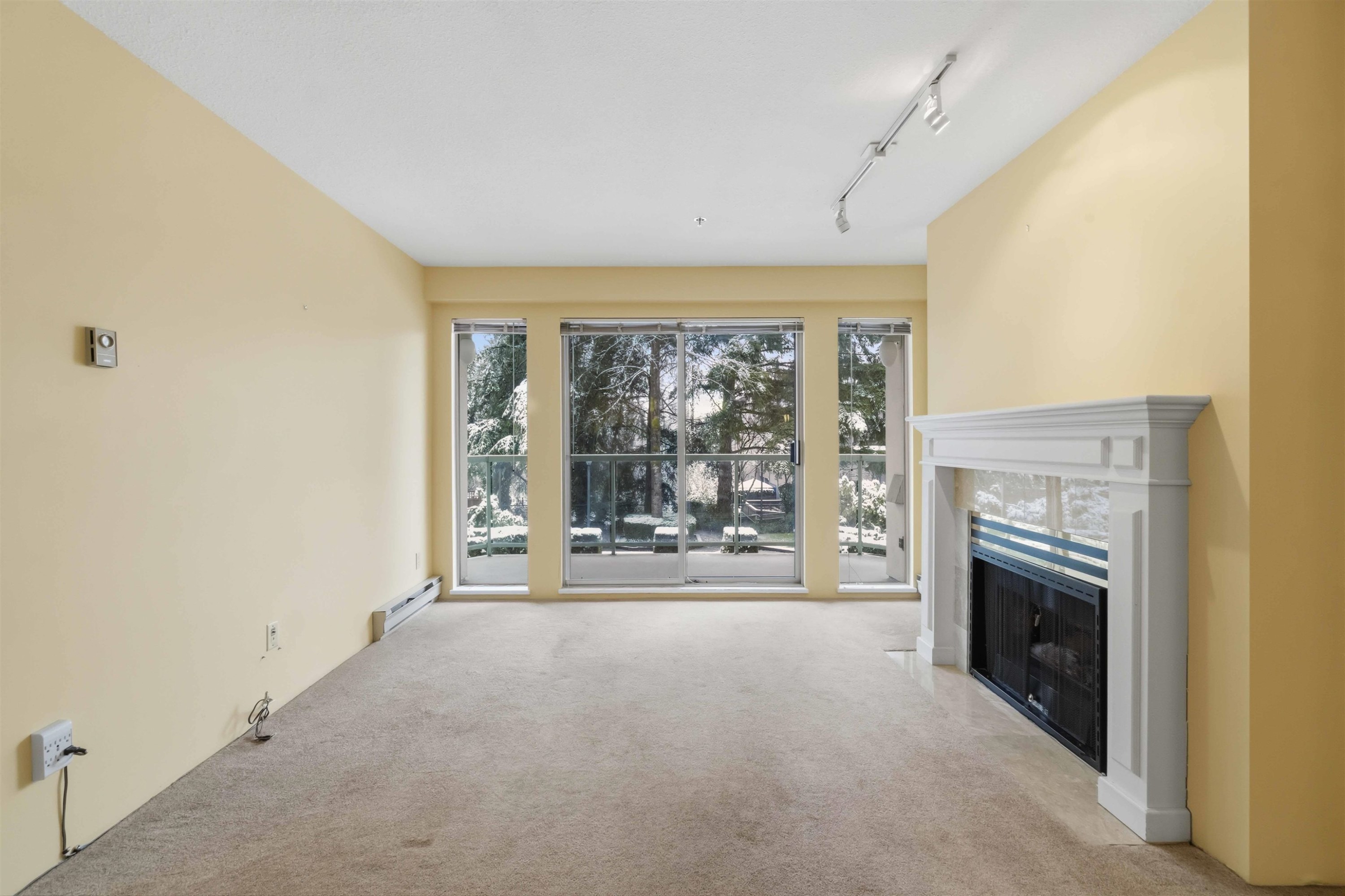 202-1148 Westwood Street, Coquitlam, BC - Indoor With Fireplace