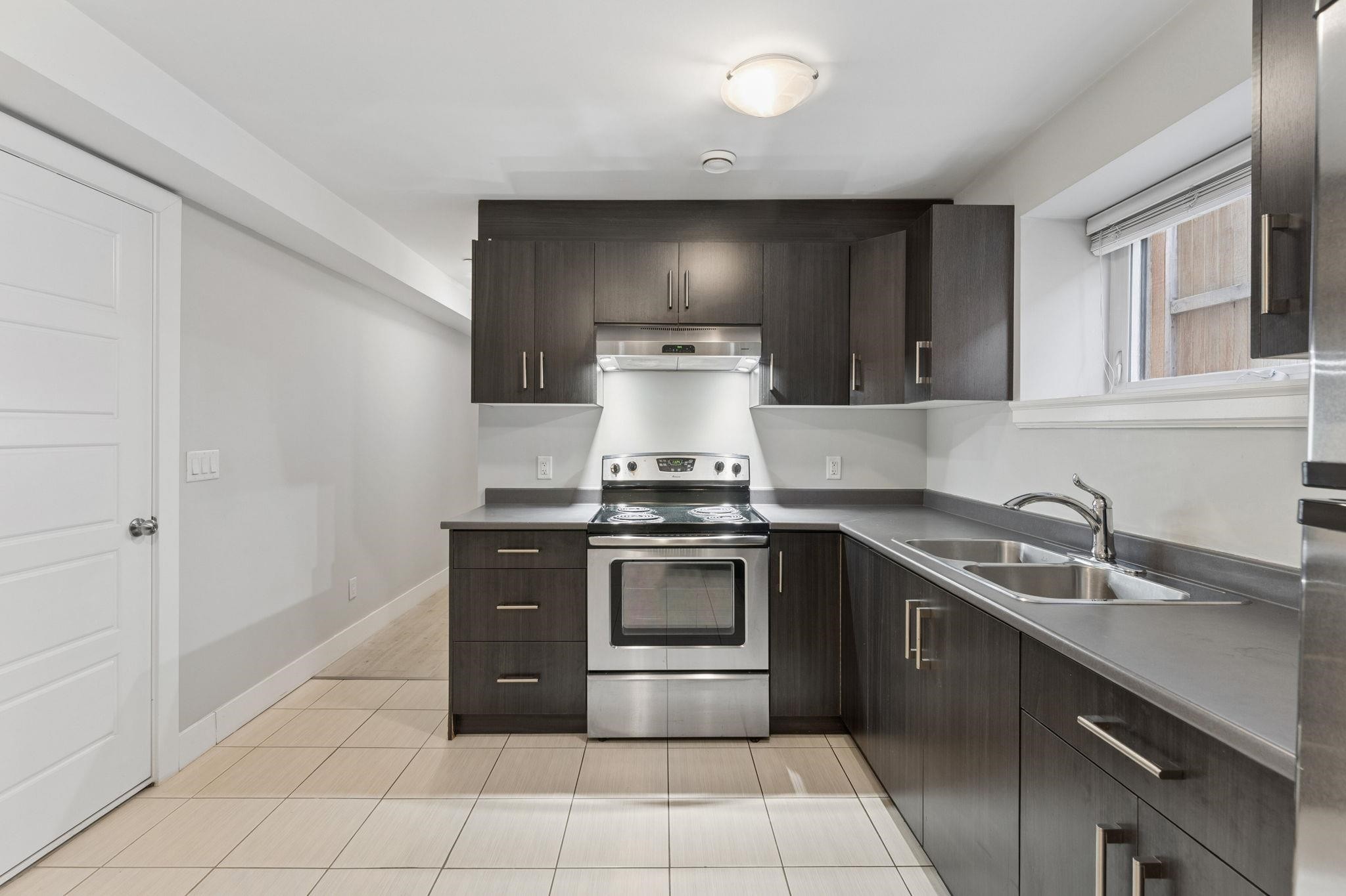 3233 Grant Street, Vancouver, BC - Indoor Photo Showing Kitchen With Double Sink