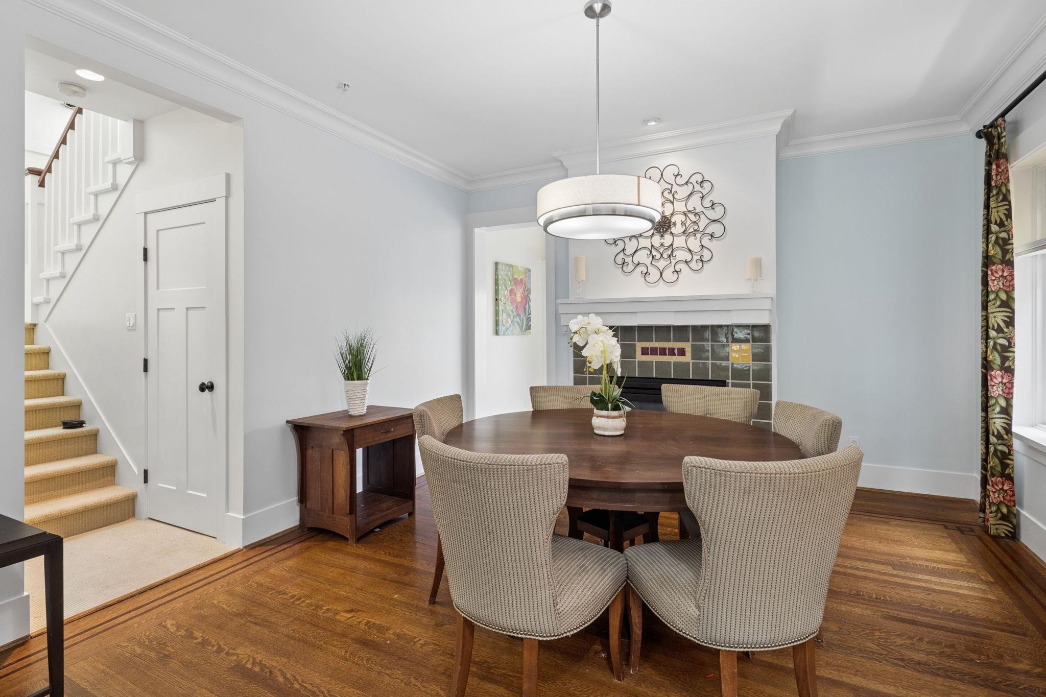 3541 8Th Avenue W, Vancouver, BC - Indoor Photo Showing Dining Room With Fireplace