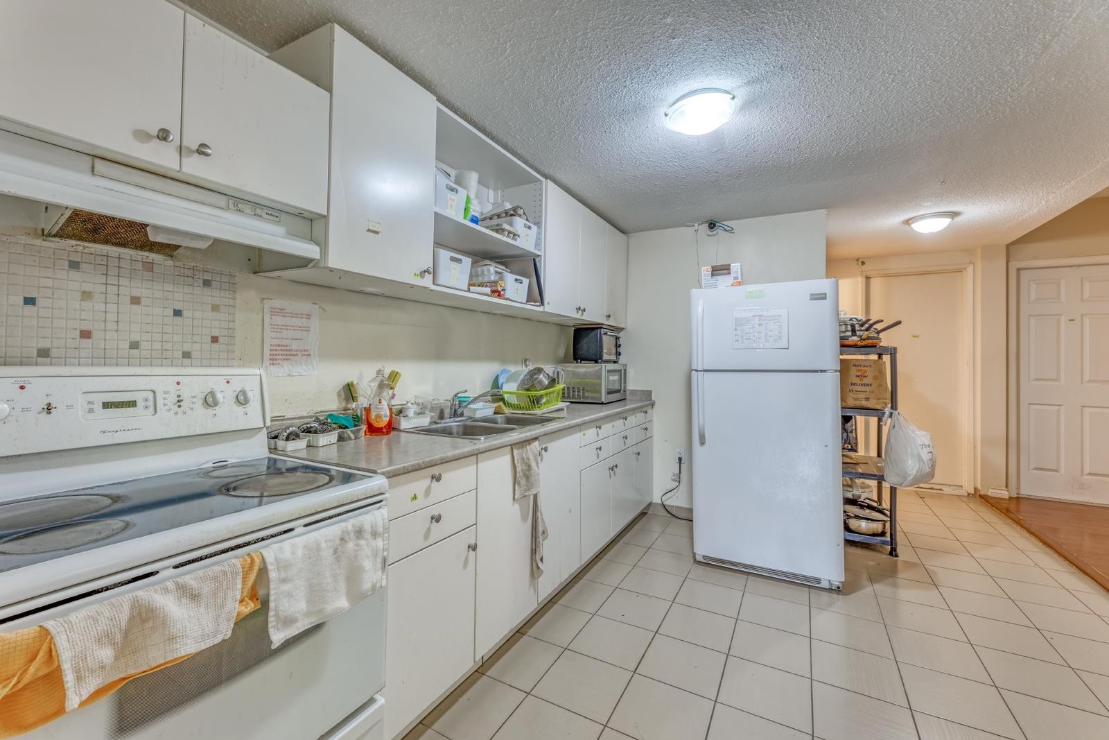 3302 5Th Avenue E, Vancouver, BC - Indoor Photo Showing Kitchen With Double Sink