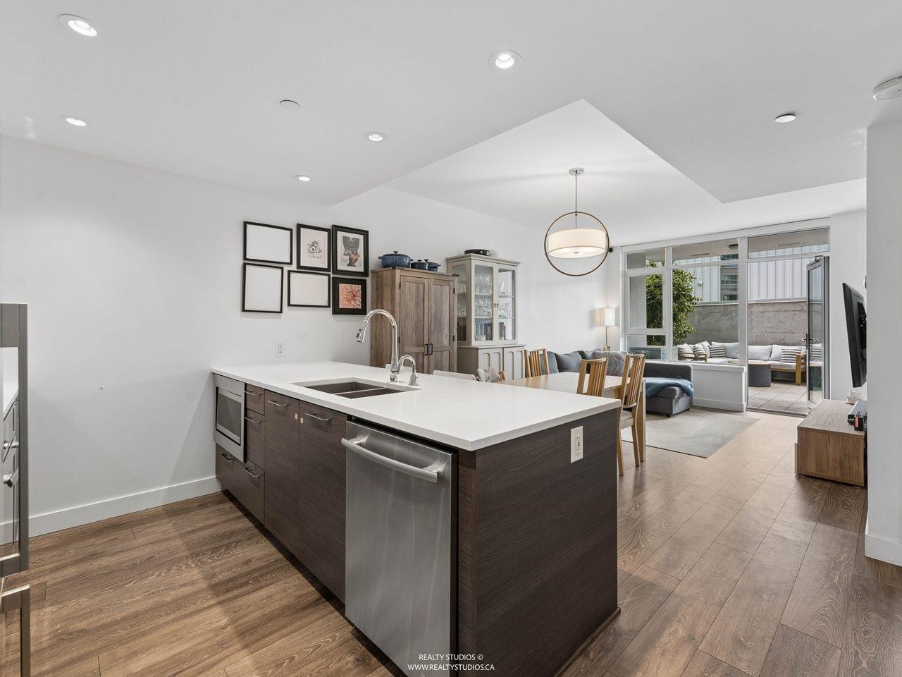 205-8538 River District Crossing, Vancouver, BC - Indoor Photo Showing Kitchen With Double Sink