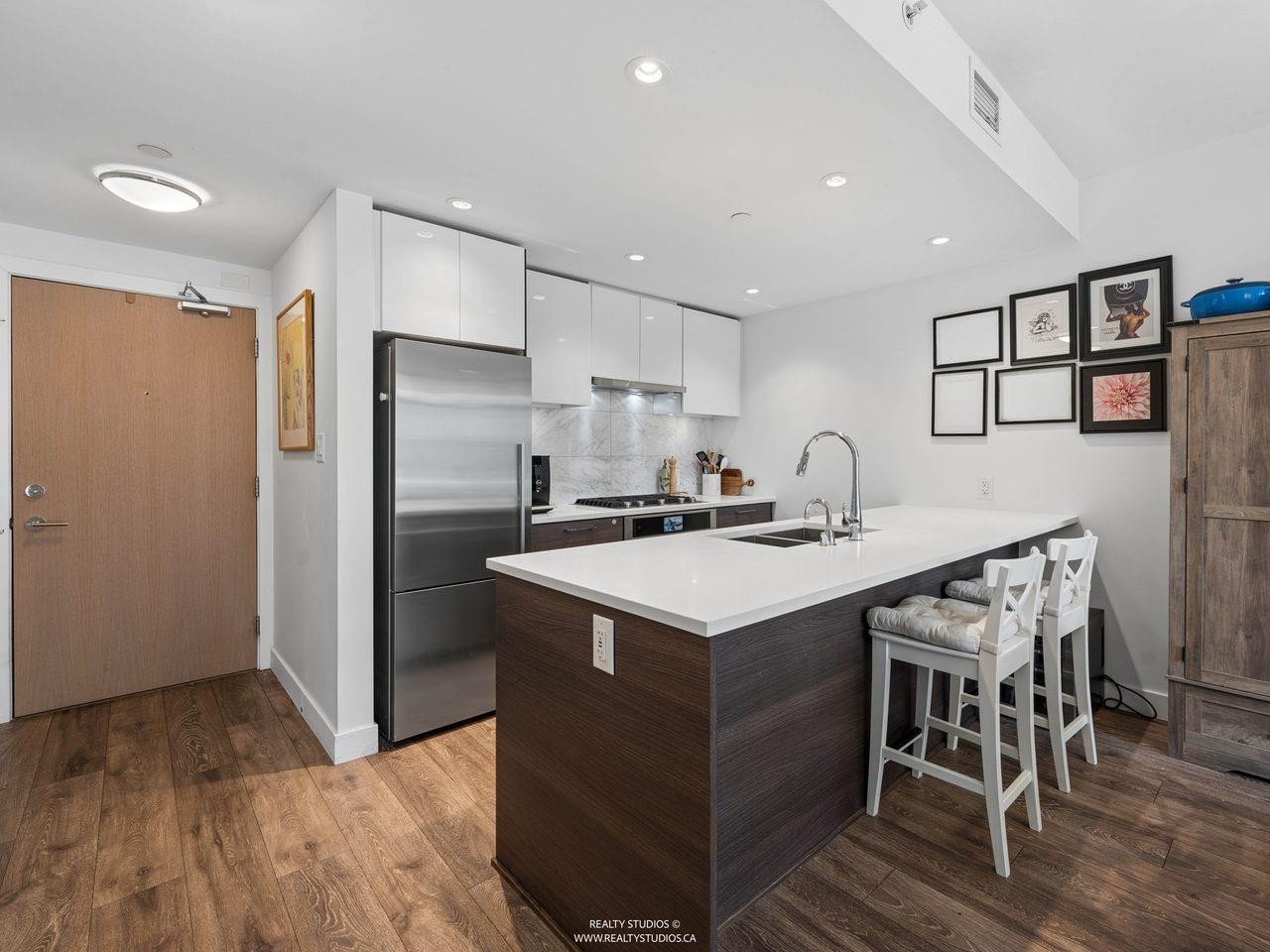205-8538 River District Crossing, Vancouver, BC - Indoor Photo Showing Kitchen With Double Sink With Upgraded Kitchen