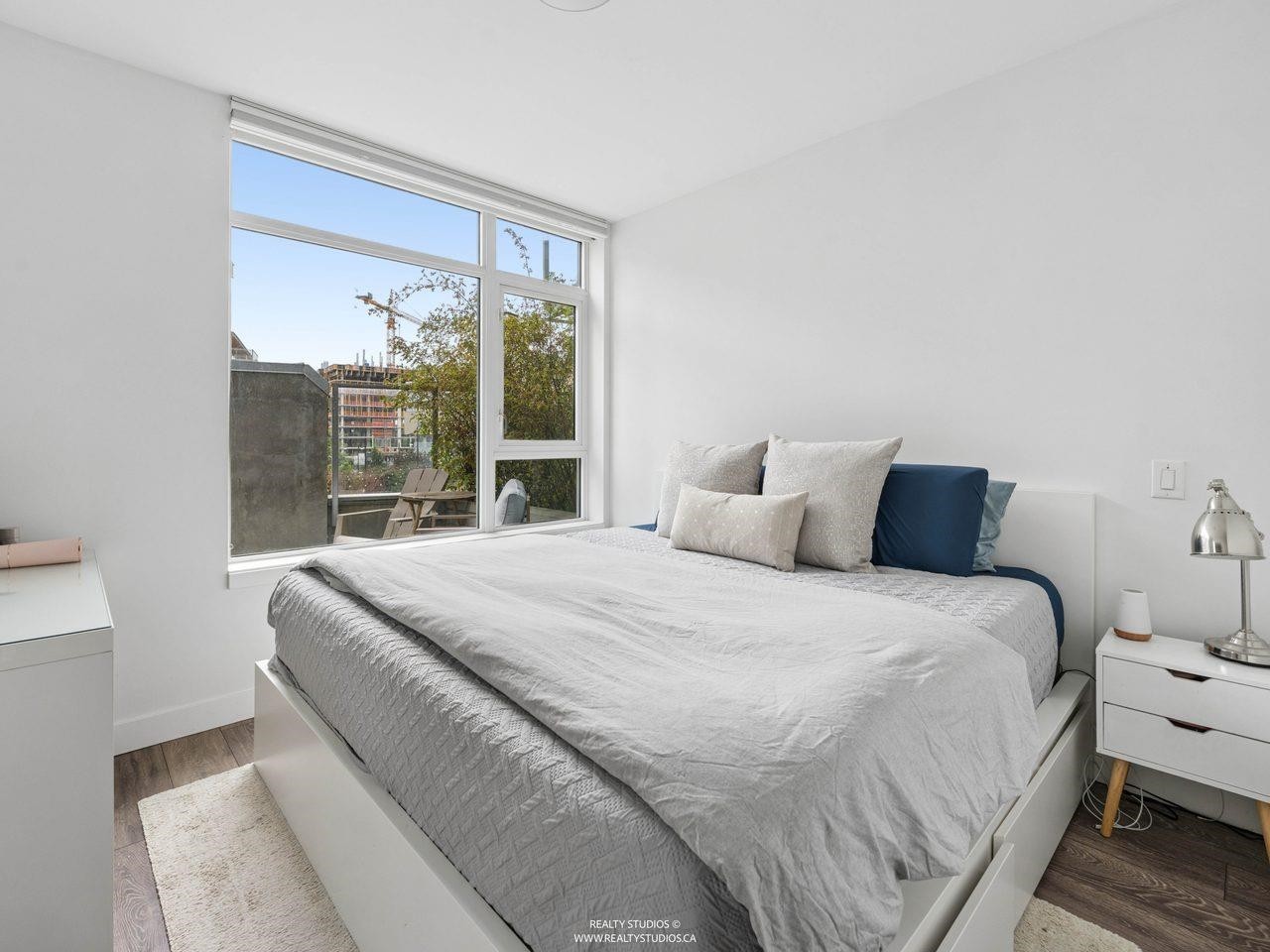 205-8538 River District Crossing, Vancouver, BC - Indoor Photo Showing Bedroom