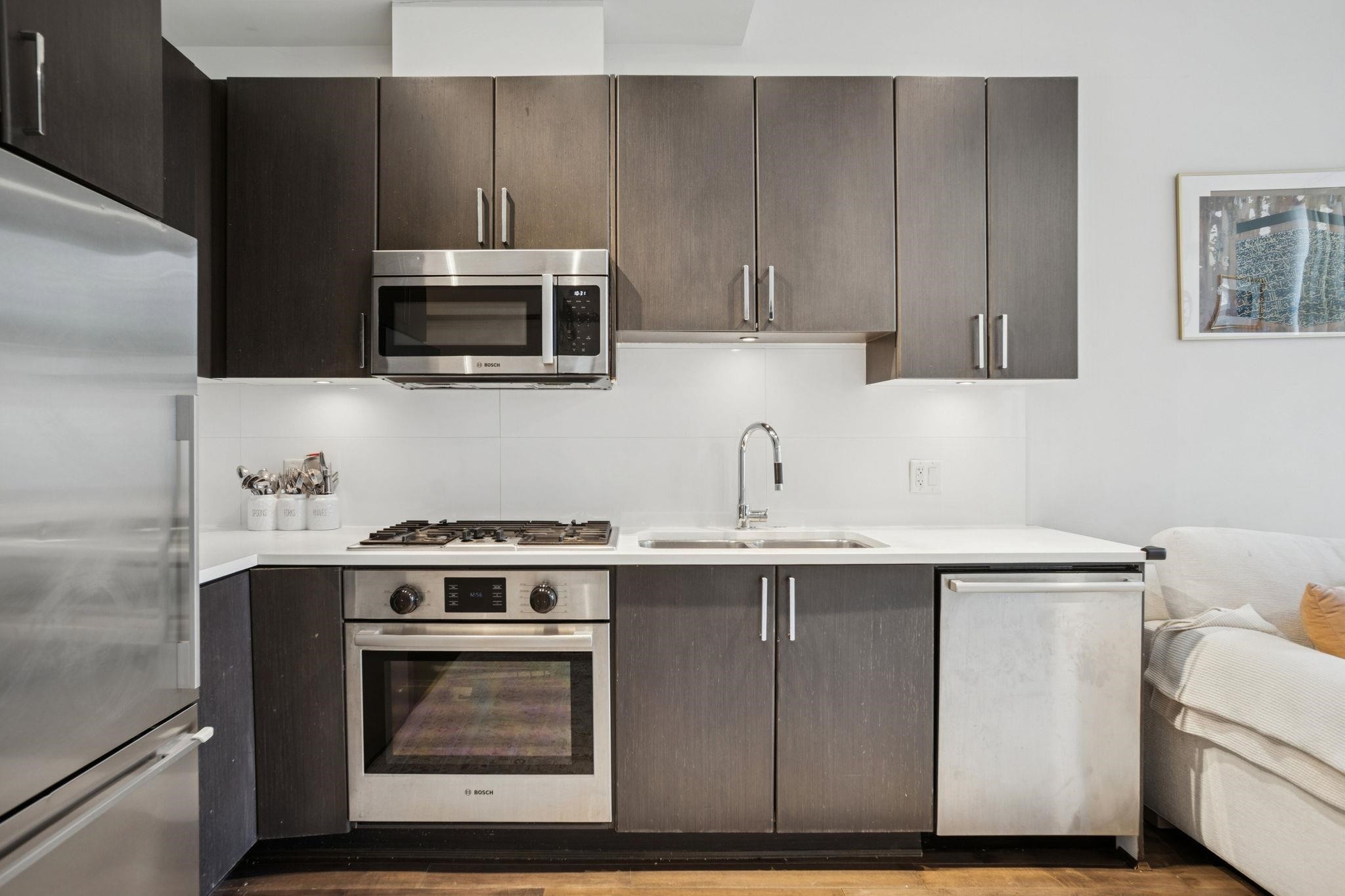62 1St Avenue W, Vancouver, BC - Indoor Photo Showing Kitchen With Double Sink With Upgraded Kitchen
