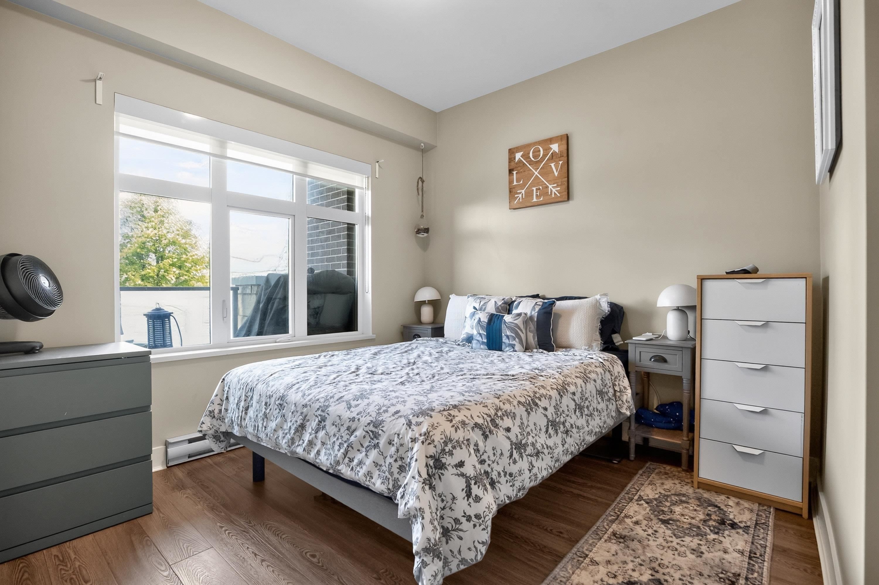 202-4710 Hastings Street, Burnaby, BC - Indoor Photo Showing Bedroom