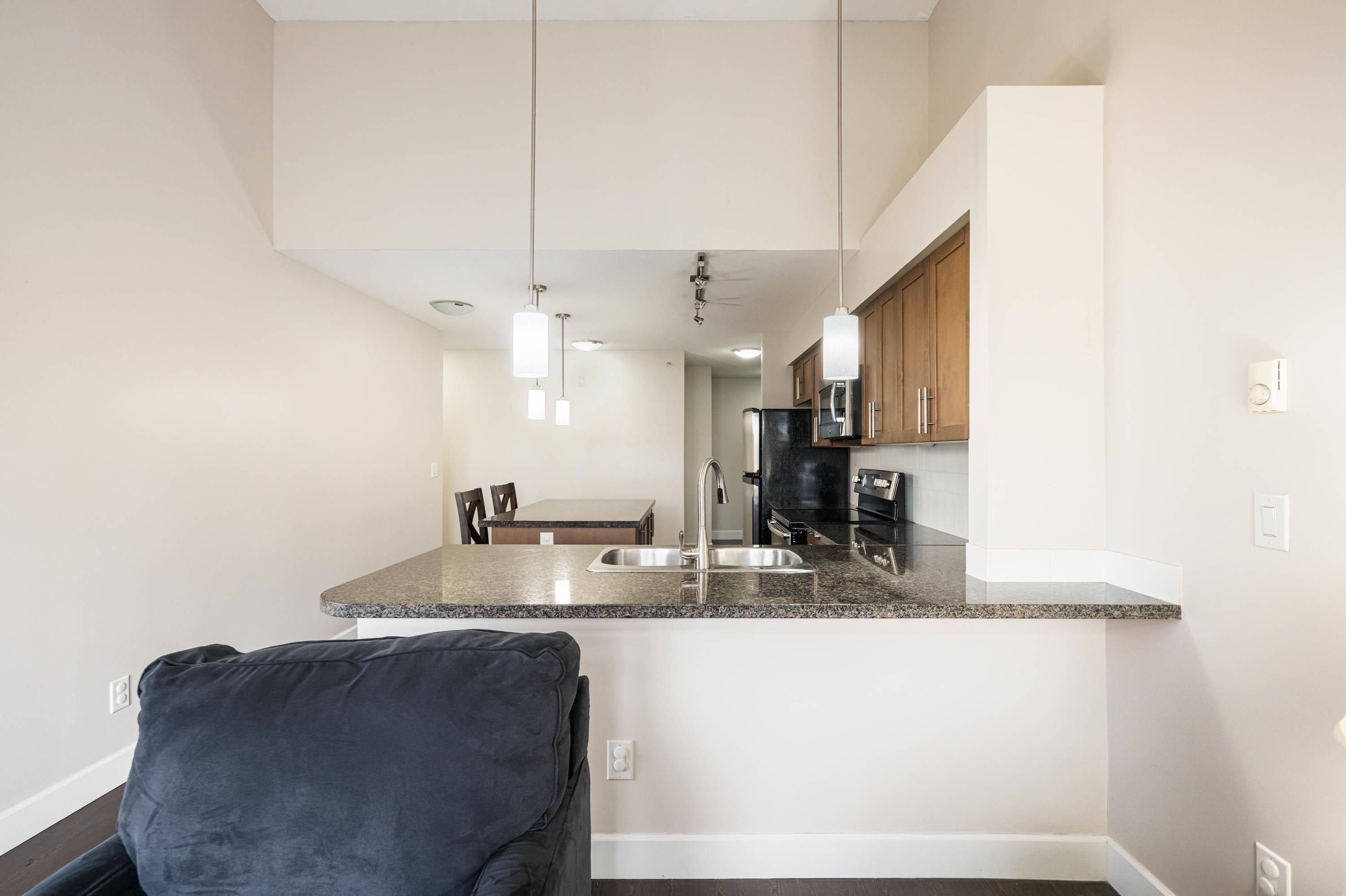 406-12283 224 Street, Maple Ridge, BC - Indoor Photo Showing Kitchen With Double Sink