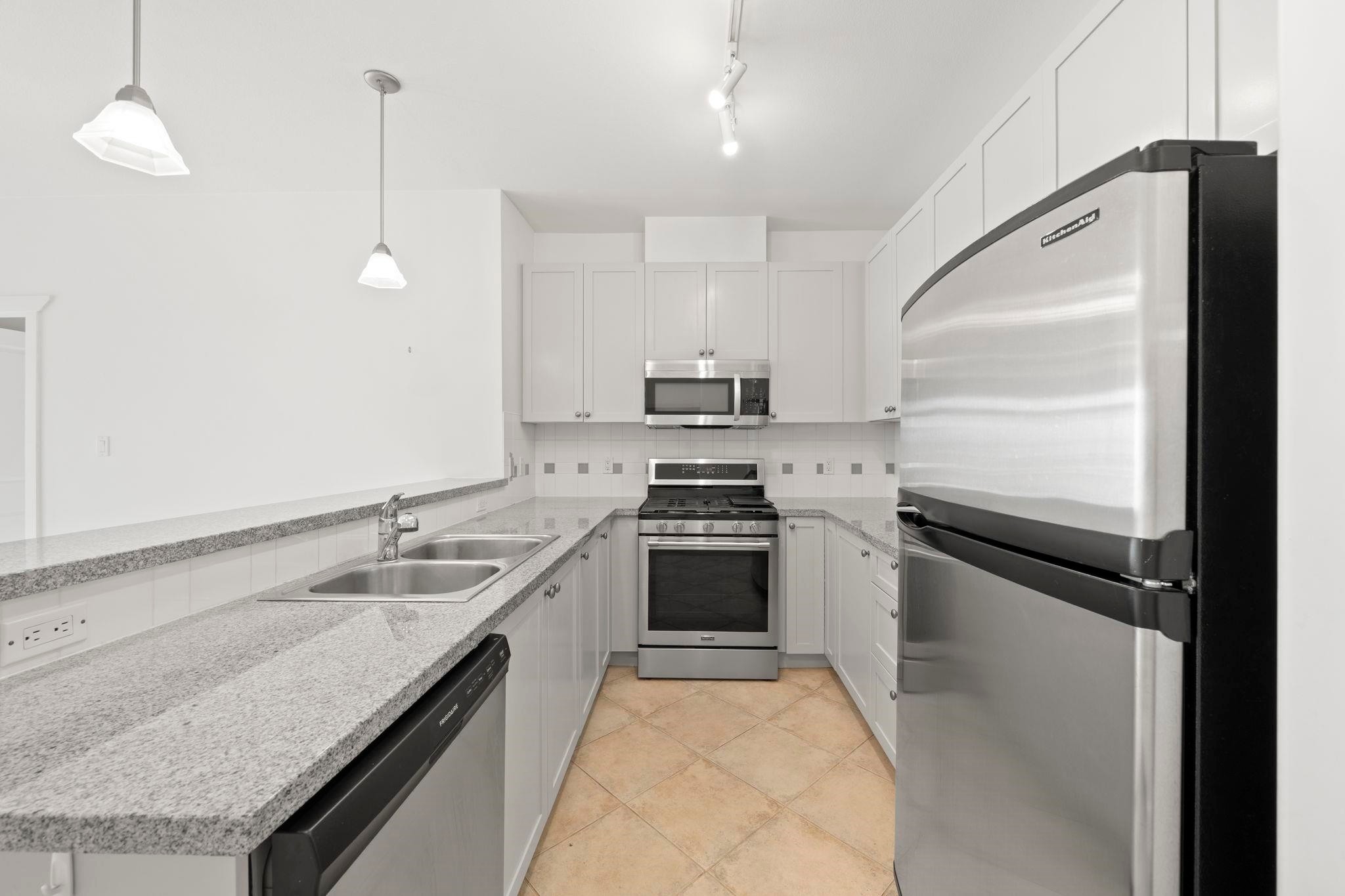 206-4211 Bayview Street, Richmond, BC - Indoor Photo Showing Kitchen With Double Sink With Upgraded Kitchen