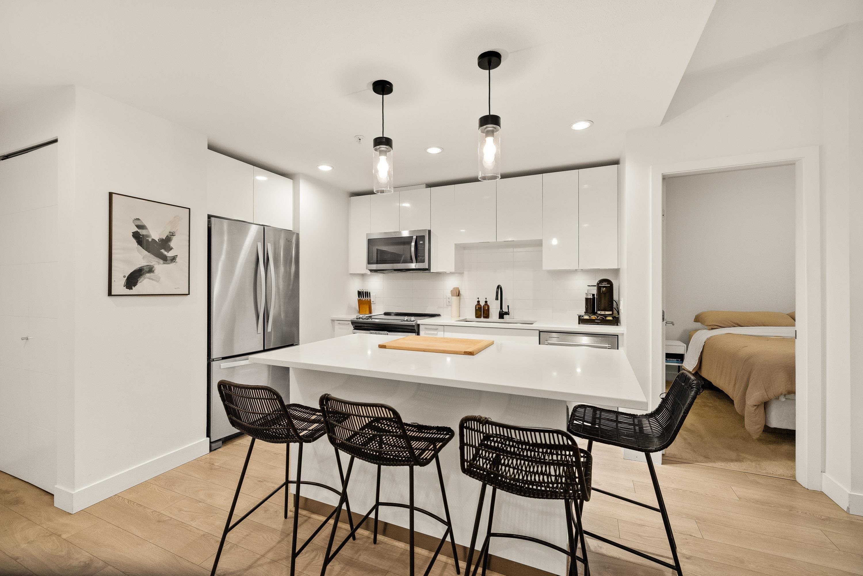 103-719 3Rd Street W, North Vancouver, BC - Indoor Photo Showing Kitchen With Stainless Steel Kitchen With Upgraded Kitchen