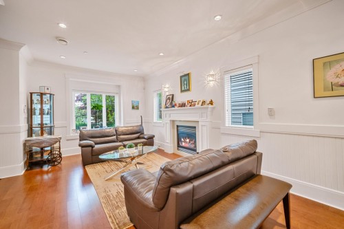 3288 32Nd Avenue W, Vancouver, BC - Indoor Photo Showing Living Room With Fireplace