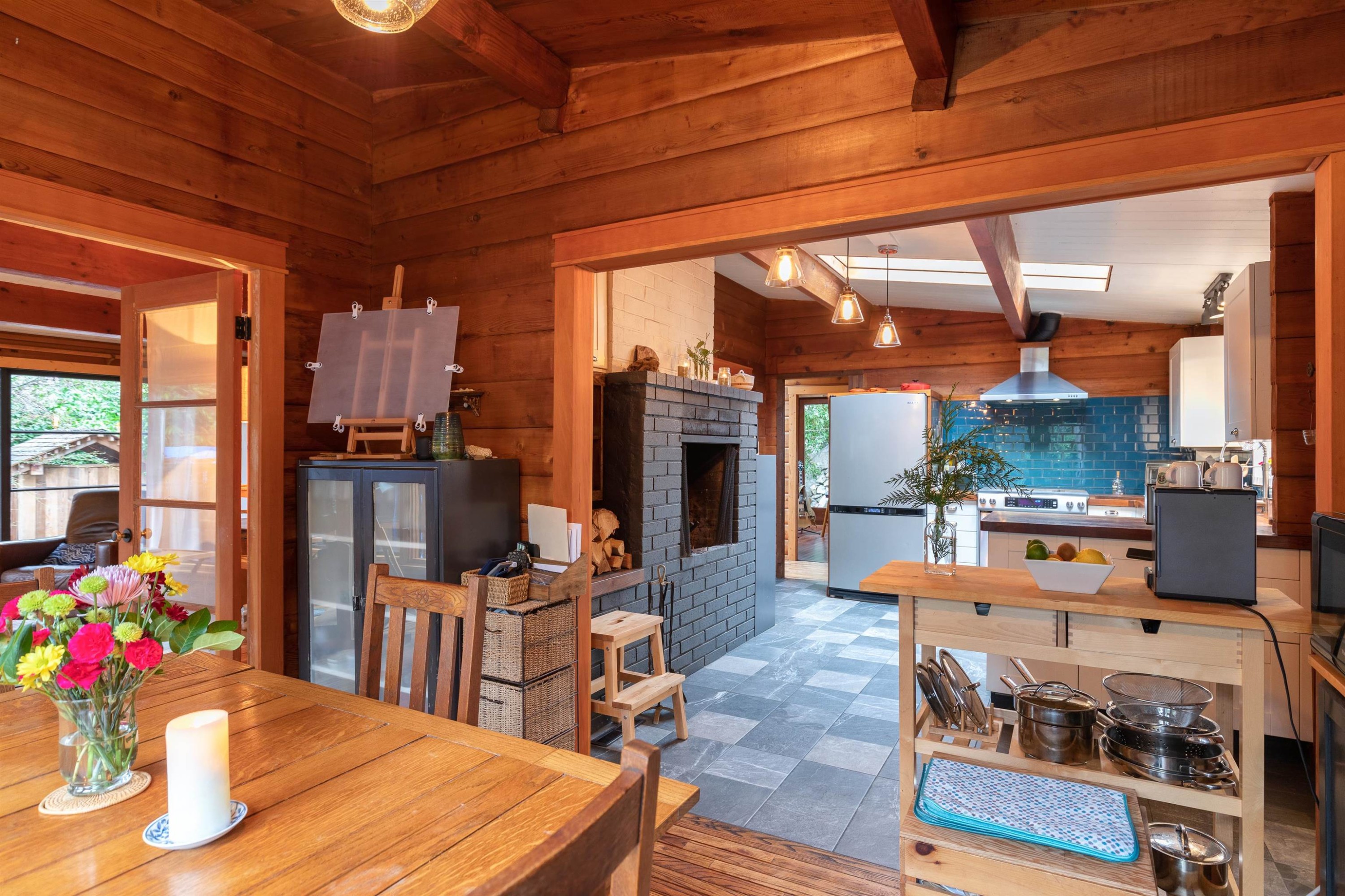 5817 Eagle Island, West Vancouver, BC - Indoor Photo Showing Dining Room With Fireplace