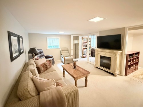 680 Thompson Avenue, Coquitlam, BC - Indoor Photo Showing Living Room With Fireplace