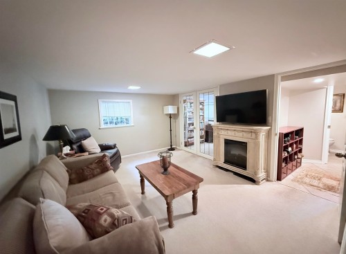 680 Thompson Avenue, Coquitlam, BC - Indoor Photo Showing Other Room With Fireplace