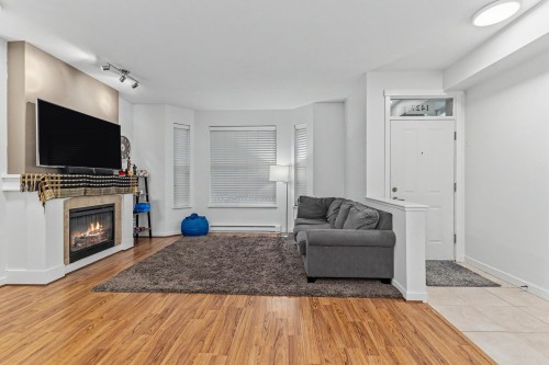 1427 Collins Road, Coquitlam, BC - Indoor Photo Showing Living Room With Fireplace