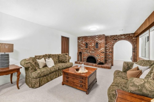 1168 Charland Avenue, Coquitlam, BC - Indoor Photo Showing Living Room With Fireplace
