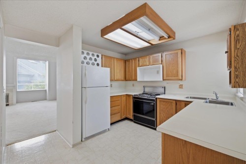 3661 Handel Avenue, Vancouver, BC - Indoor Photo Showing Kitchen With Double Sink