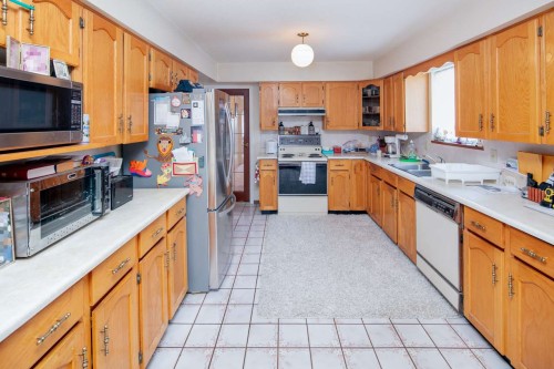 4391 Westminster Highway, Richmond, BC - Indoor Photo Showing Kitchen With Double Sink