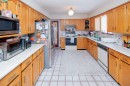 4391 Westminster Highway, Richmond, BC  - Indoor Photo Showing Kitchen With Double Sink 
