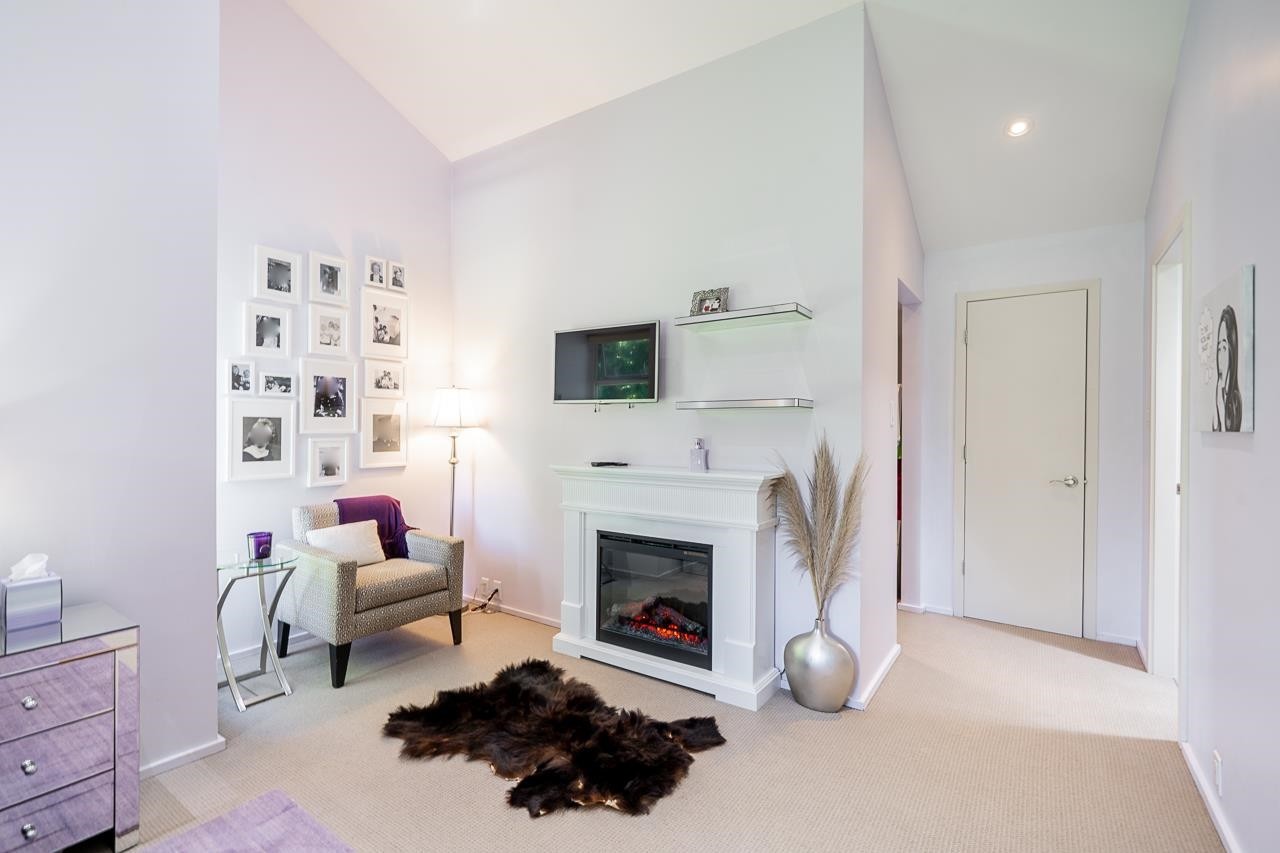 4241 Yuculta Crescent, Vancouver, BC - Indoor Photo Showing Bedroom With Fireplace