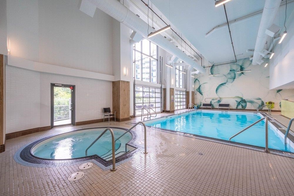 302-8533 River District Crossing, Vancouver, BC - Indoor Photo Showing Other Room With In Ground Pool