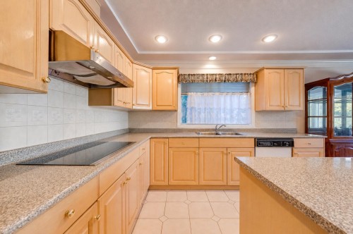 7038 Bridge Street, Richmond, BC - Indoor Photo Showing Kitchen With Double Sink