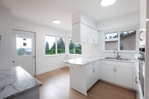 1410 Dansey Avenue, Coquitlam, BC - Indoor Photo Showing Kitchen With Double Sink
