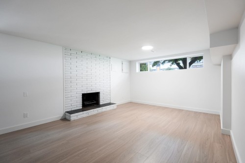 1410 Dansey Avenue, Coquitlam, BC - Indoor With Fireplace