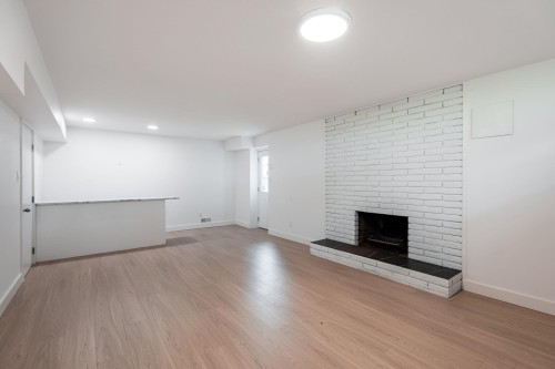 1410 Dansey Avenue, Coquitlam, BC - Indoor With Fireplace