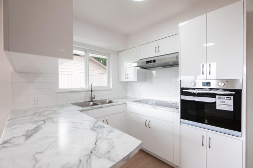 1410 Dansey Avenue, Coquitlam, BC - Indoor Photo Showing Kitchen With Double Sink