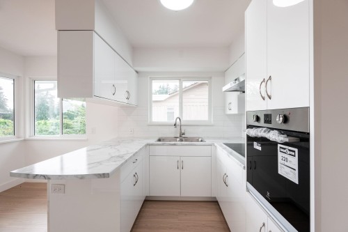 1410 Dansey Avenue, Coquitlam, BC - Indoor Photo Showing Kitchen With Double Sink