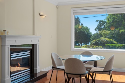2189 Argyle Avenue, West Vancouver, BC - Indoor Photo Showing Dining Room With Fireplace