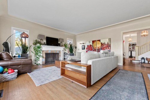 4540 3Rd Avenue W, Vancouver, BC - Indoor Photo Showing Living Room With Fireplace