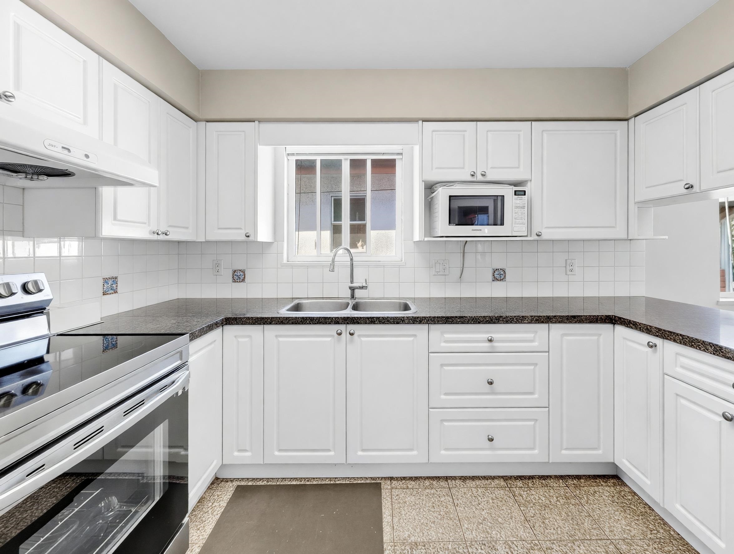 245 63Rd Avenue W, Vancouver, BC - Indoor Photo Showing Kitchen With Double Sink