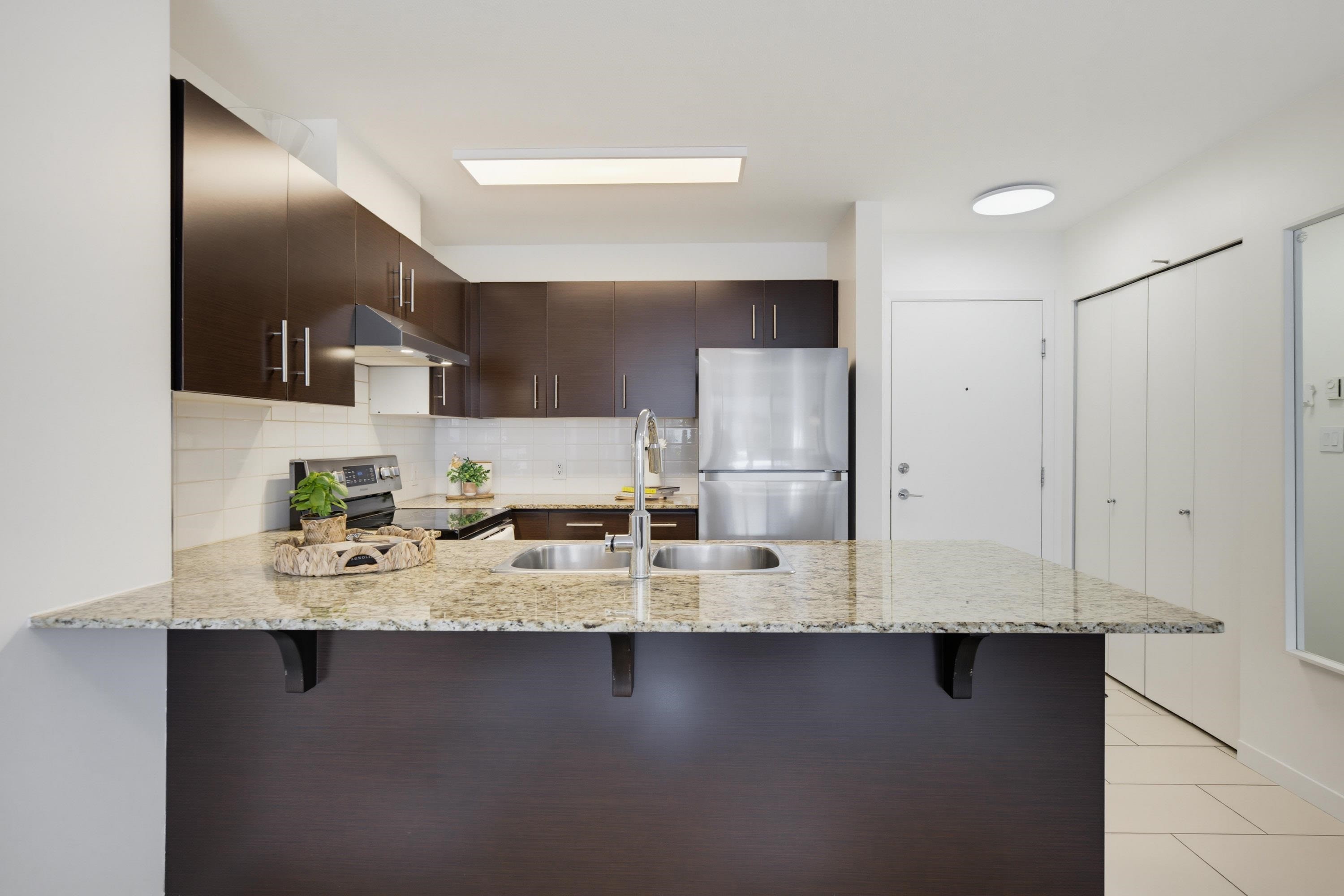 412-11665 Haney Bypass, Maple Ridge, BC - Indoor Photo Showing Kitchen With Double Sink With Upgraded Kitchen
