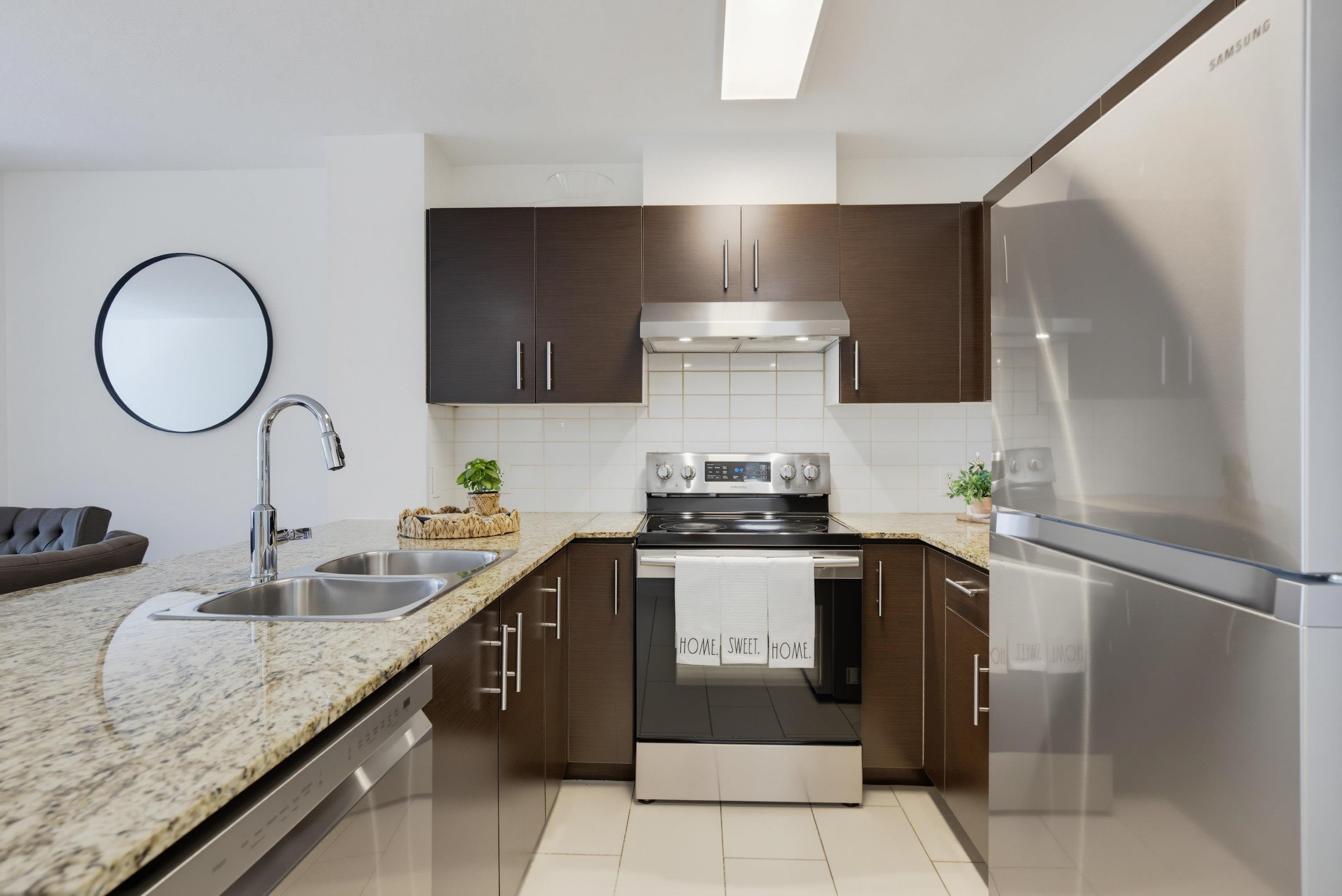 412-11665 Haney Bypass, Maple Ridge, BC - Indoor Photo Showing Kitchen With Double Sink With Upgraded Kitchen