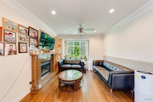 3036 1St Avenue E, Vancouver, BC - Indoor Photo Showing Living Room With Fireplace