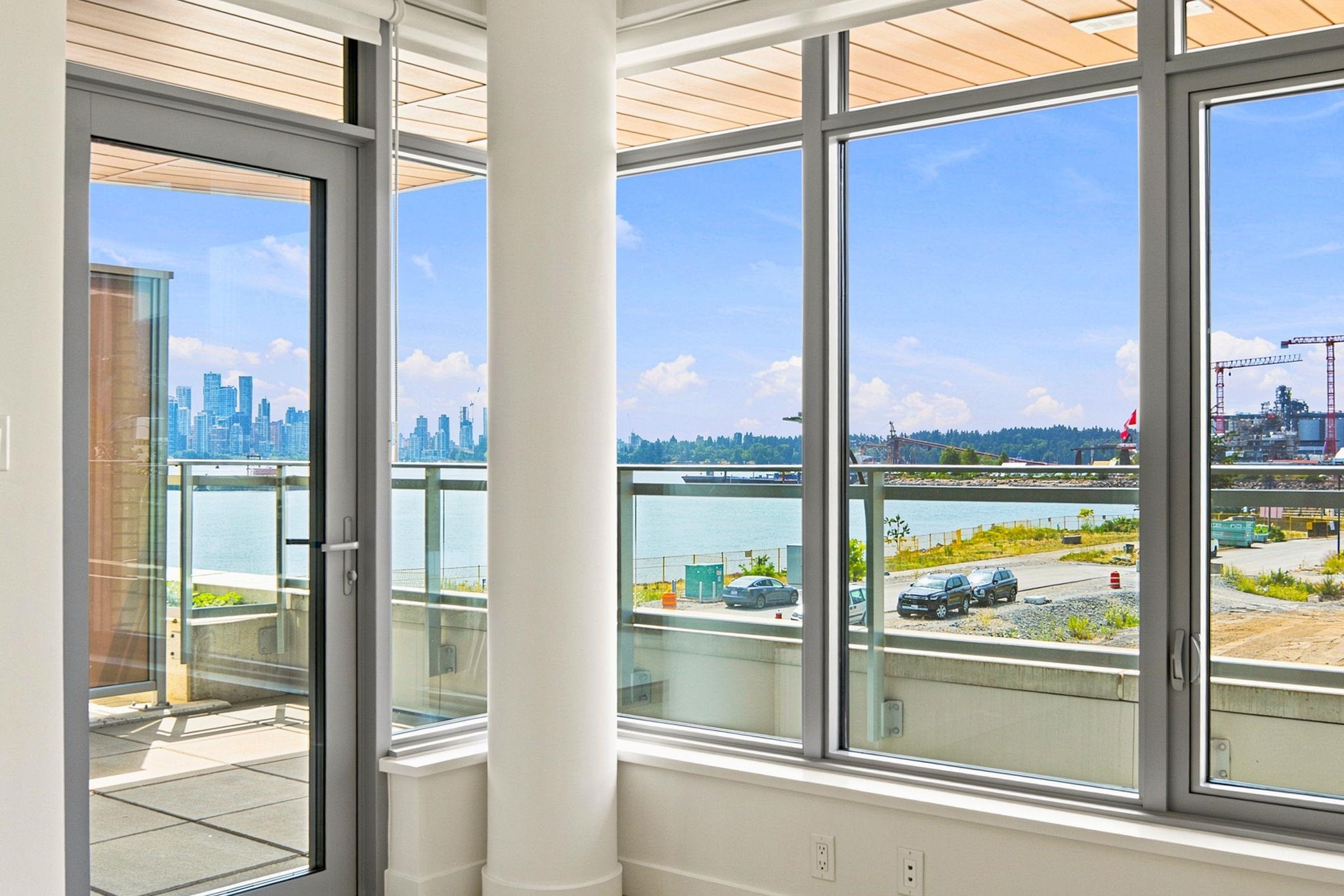 301-785 Harbour Way, North Vancouver, BC - Indoor Photo Showing Other Room With Body Of Water